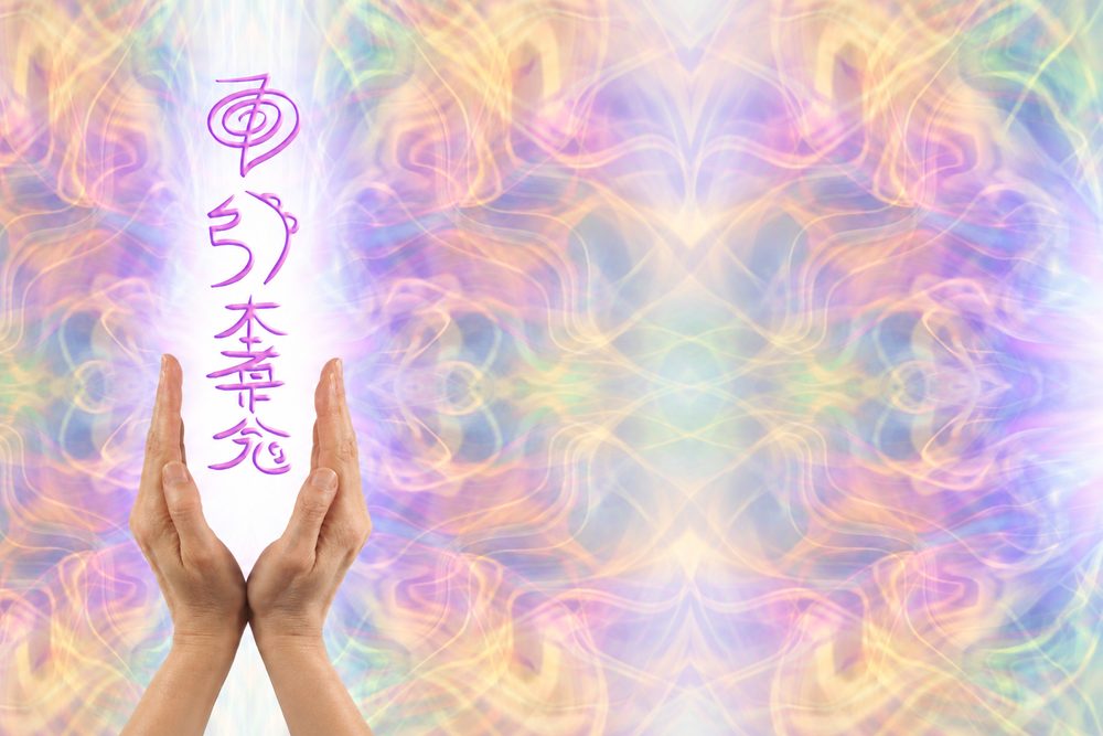 Two hands held upright beneath the three Usui Reiki symbols, drawn in violet light.